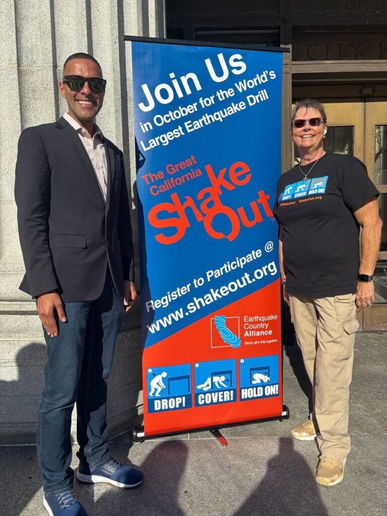 Picture of Ray Bonilla and Dena Gunning with ShakeOut sign